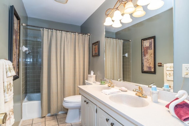 4525 W Middle Ct, Bloomington, IN 47403 - bathroom with tile patterned flooring, double vanity, a chandelier, and shower / tub combo with curtain
