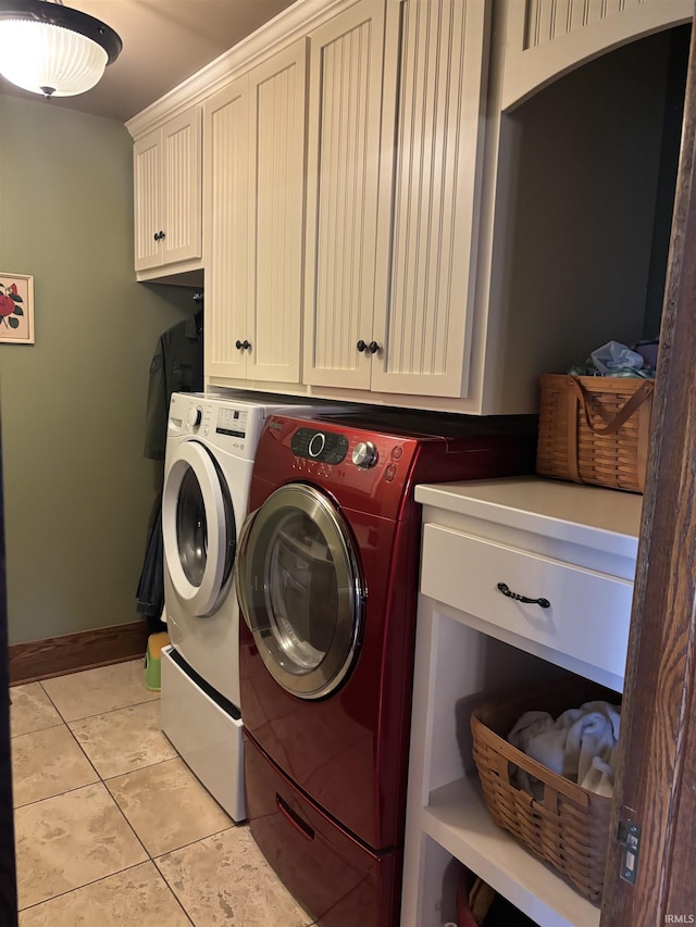 7614 N 100 W Rd, Uniondale, IN 46791 - washroom with cabinet space, washing machine and dryer, and light tile patterned floors