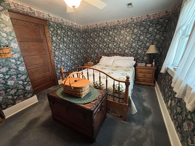 7614 N 100 W Rd, Uniondale, IN 46791 - bedroom with wallpapered walls, carpet, and a ceiling fan