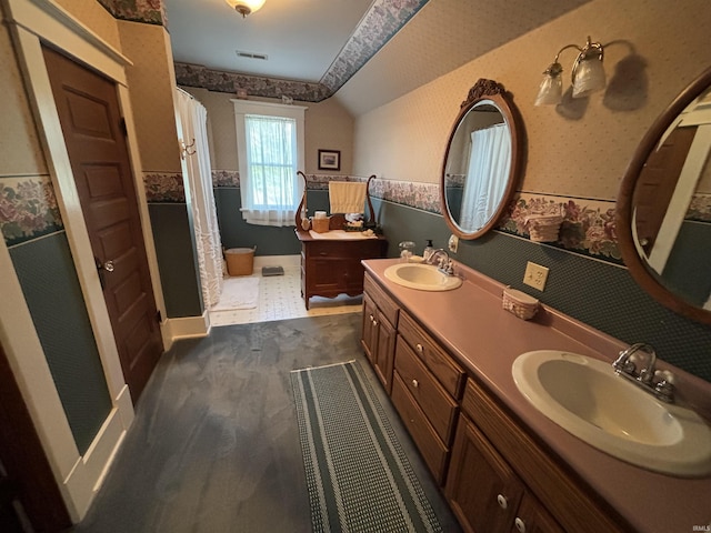 7614 N 100 W Rd, Uniondale, IN 46791 - full bathroom with wallpapered walls, double vanity, and curtained shower