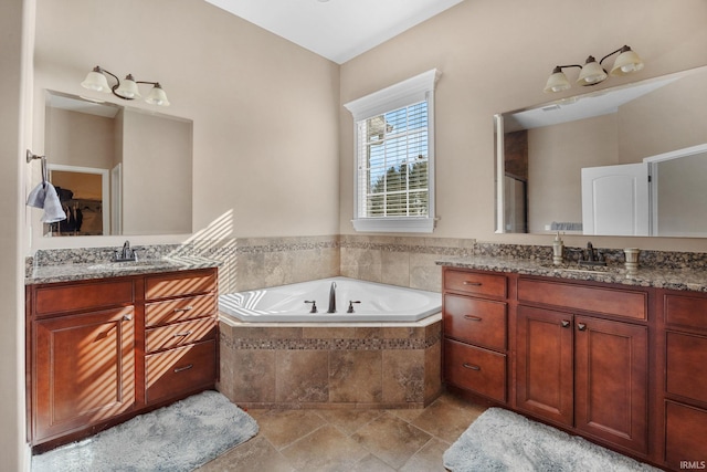 1130 Kingswood Rd, West Lafayette, IN 47906 - full bath featuring two vanities and a bath