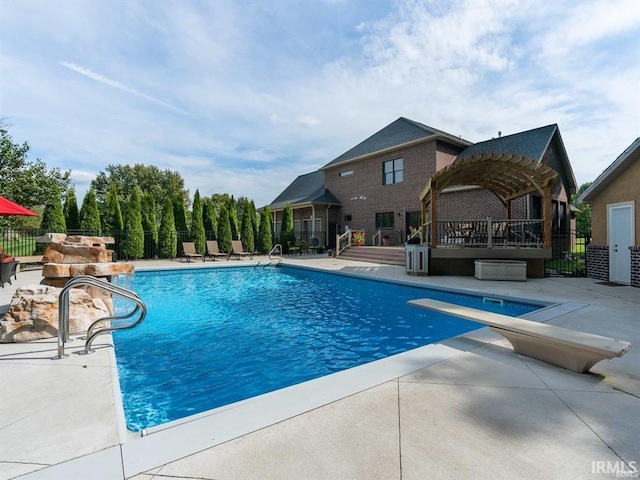 1130 Kingswood Rd, West Lafayette, IN 47906 - view of swimming pool featuring a pergola, a patio area, and a diving board