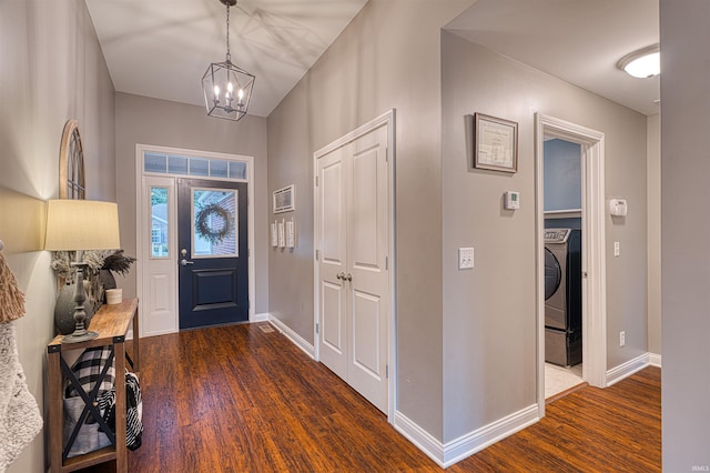 2407 Ellington Ridge Dr, Evansville, IN 47711 - foyer entrance featuring wood finished floors, a chandelier, and washer / dryer