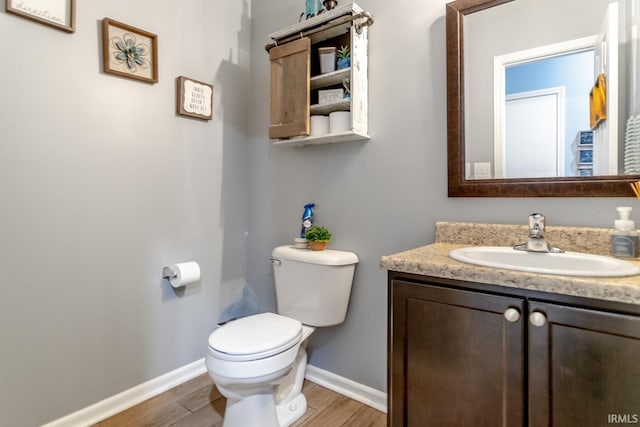 297 Indigo St, Lafayette, IN 47909 - bathroom featuring vanity and wood finished floors