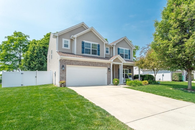 297 Indigo St, Lafayette, IN 47909 - view of front of property featuring a gate, an attached garage, concrete driveway, and brick siding