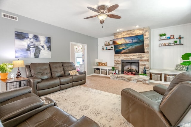 297 Indigo St, Lafayette, IN 47909 - living area featuring a ceiling fan, a fireplace, and carpet flooring