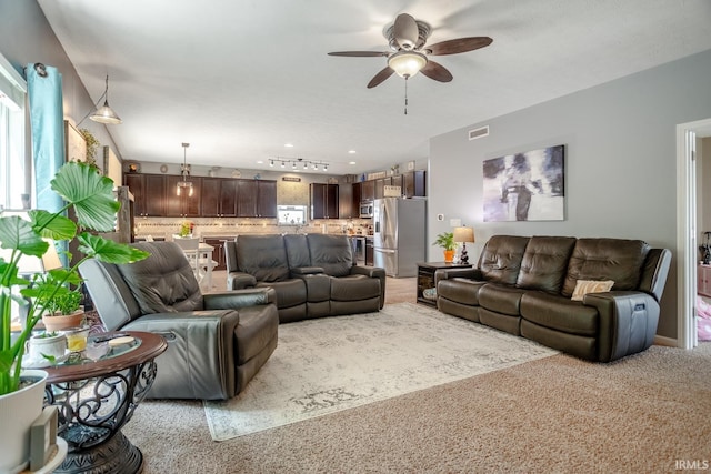 297 Indigo St, Lafayette, IN 47909 - living area with a ceiling fan and light carpet