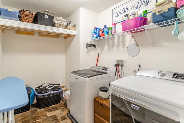 297 Indigo St, Lafayette, IN 47909 - laundry room with separate washer and dryer and stone finish floors