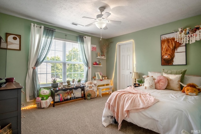 297 Indigo St, Lafayette, IN 47909 - carpeted bedroom featuring a textured ceiling and a ceiling fan