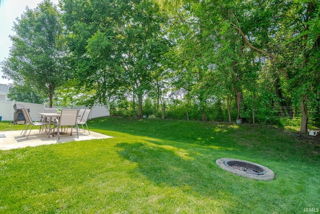 297 Indigo St, Lafayette, IN 47909 - view of yard with a fire pit and a patio area