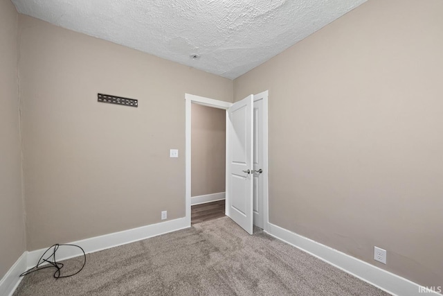 621 S 28th St, Lafayette, IN 47904 - empty room with carpet and a textured ceiling