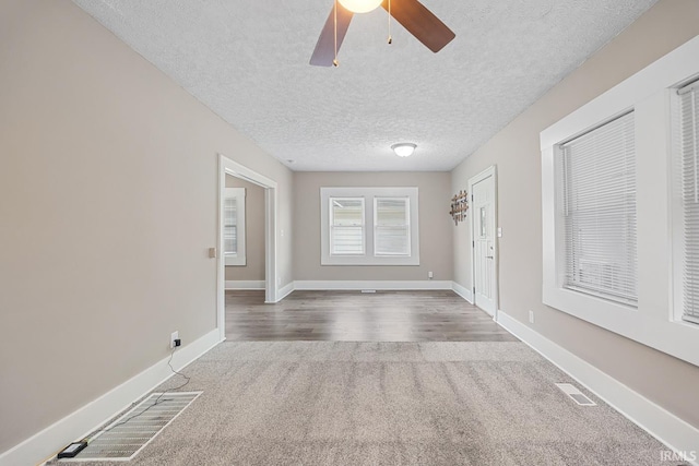 621 S 28th St, Lafayette, IN 47904 - foyer entrance with carpet, a textured ceiling, and ceiling fan