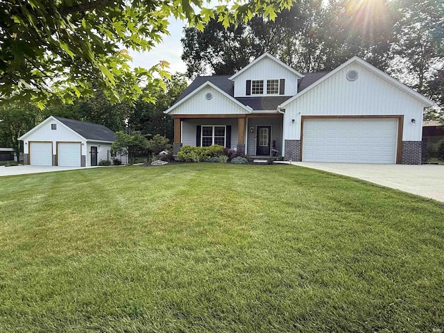 1285 E Zinnia Dr, Bloomington, IN 47401 - view of front facade with a front lawn, a porch, brick siding, an attached garage, and board and batten siding