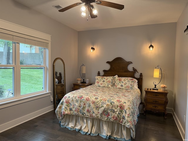 1285 E Zinnia Dr, Bloomington, IN 47401 - bedroom featuring multiple windows, dark wood-style floors, and ceiling fan