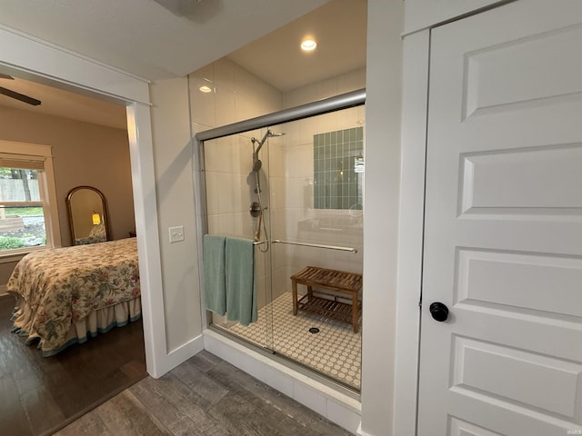 1285 E Zinnia Dr, Bloomington, IN 47401 - ensuite bathroom with wood finished floors, a shower stall, recessed lighting, and ceiling fan