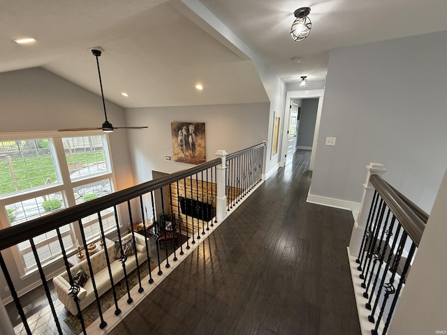 1285 E Zinnia Dr, Bloomington, IN 47401 - corridor with an upstairs landing, dark wood-style flooring, recessed lighting, and vaulted ceiling