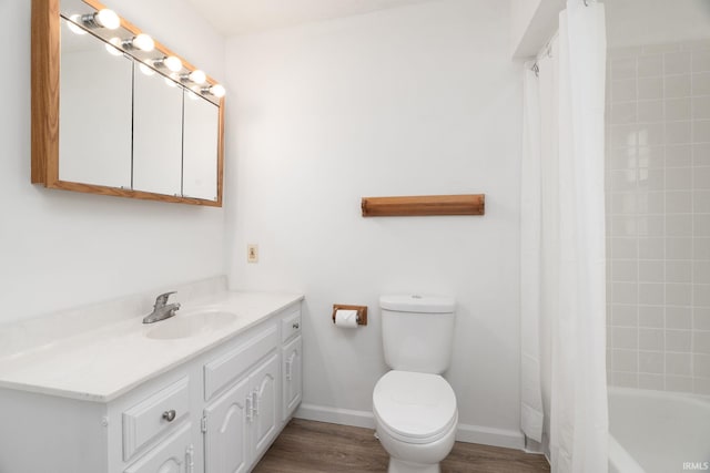115 S 27th St, Lafayette, IN 47904 - full bathroom with vanity, wood finished floors, and shower / tub combo with curtain