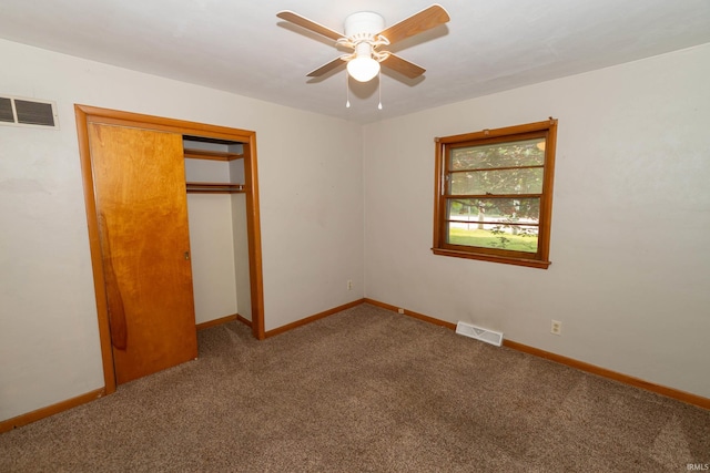 18655 Cleveland Rd, South Bend, IN 46637 - unfurnished bedroom featuring carpet flooring, a closet, and ceiling fan