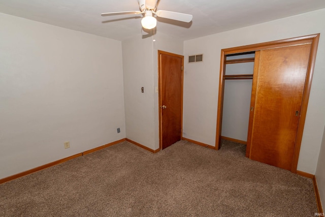 18655 Cleveland Rd, South Bend, IN 46637 - unfurnished bedroom featuring carpet, a closet, and ceiling fan