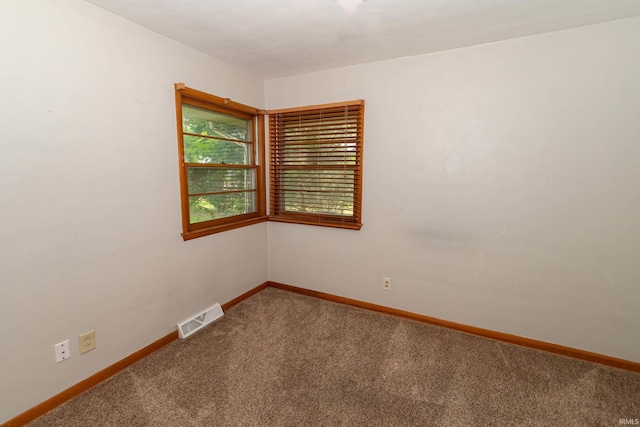 18655 Cleveland Rd, South Bend, IN 46637 - carpeted spare room featuring baseboards