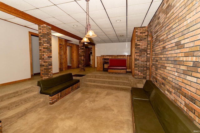 18655 Cleveland Rd, South Bend, IN 46637 - building lobby featuring brick wall, a drop ceiling, and recessed lighting