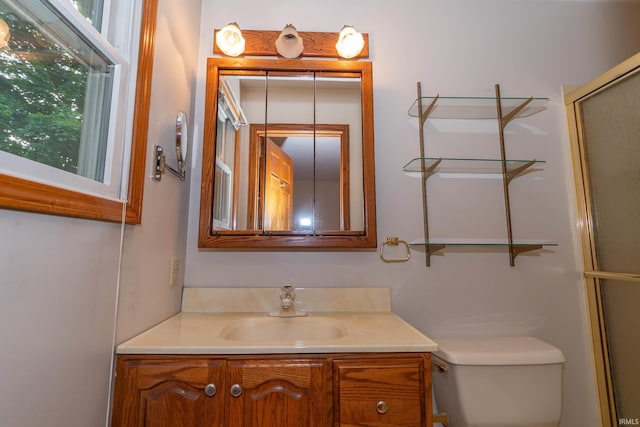 18633 Cleveland Rd, South Bend, IN 46637 - bathroom with vanity and a shower with shower door