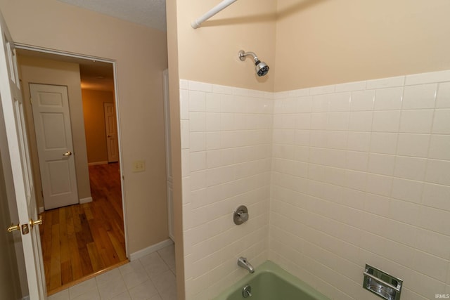 18633 Cleveland Rd, South Bend, IN 46637 - bathroom with shower / tub combination and tile patterned floors