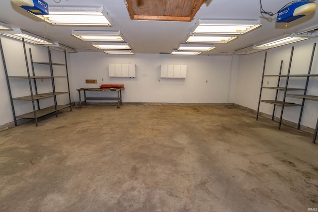 18633 Cleveland Rd, South Bend, IN 46637 - basement featuring a garage and baseboards