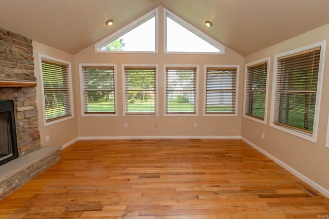 18633 Cleveland Rd, South Bend, IN 46637 - unfurnished sunroom featuring lofted ceiling and wood finished floors