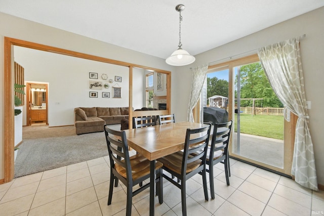 14628 Firethorne Path, Fort Wayne, IN 46814 - dining area featuring light tile patterned flooring and light colored carpet