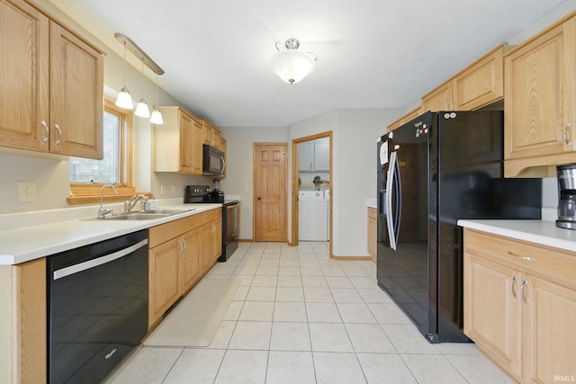 14628 Firethorne Path, Fort Wayne, IN 46814 - kitchen with black appliances, washer / dryer, light brown cabinets, light tile patterned flooring, and light countertops