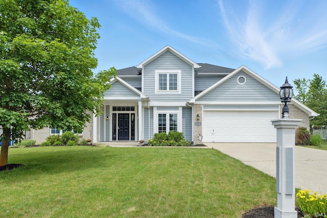 14628 Firethorne Path, Fort Wayne, IN 46814 - view of front of property featuring concrete driveway, a garage, and a front yard