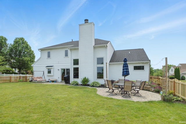 14628 Firethorne Path, Fort Wayne, IN 46814 - rear view of property featuring a fenced backyard, a patio area, and a chimney