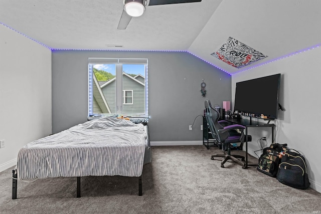 1014 Happy Hollow Rd, West Lafayette, IN 47906 - bedroom with carpet flooring, vaulted ceiling, and a ceiling fan