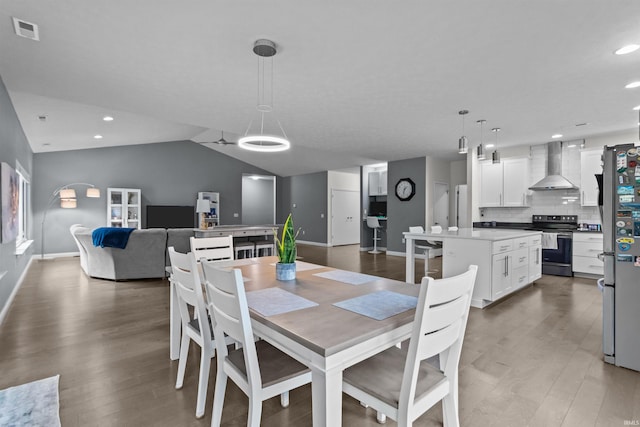 1014 Happy Hollow Rd, West Lafayette, IN 47906 - dining room featuring wood finished floors, recessed lighting, and vaulted ceiling