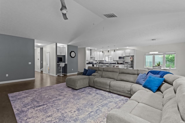 1014 Happy Hollow Rd, West Lafayette, IN 47906 - living room with vaulted ceiling and dark wood-type flooring