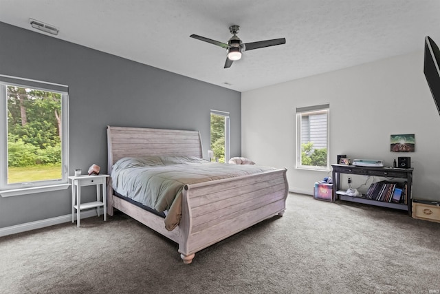1014 Happy Hollow Rd, West Lafayette, IN 47906 - bedroom featuring multiple windows, carpet, and a ceiling fan