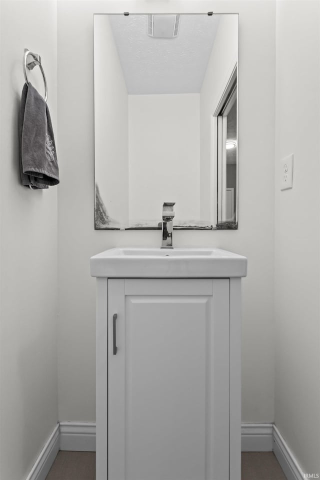 1014 Happy Hollow Rd, West Lafayette, IN 47906 - bathroom with baseboards and vanity