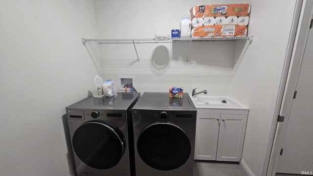 1014 Happy Hollow Rd, West Lafayette, IN 47906 - laundry room featuring cabinet space, washer and clothes dryer, and tile patterned flooring