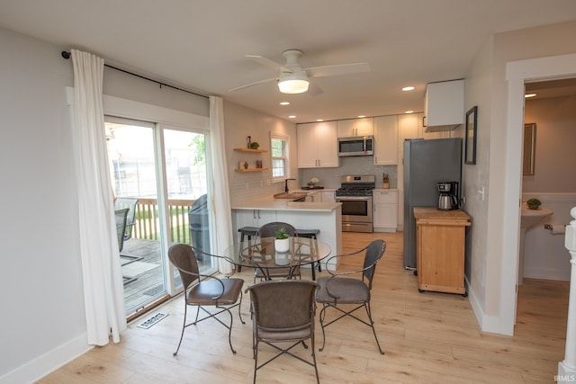 1914 Bayberry Ln, West Lafayette, IN 47906 - dining space with a ceiling fan, light wood finished floors, and recessed lighting