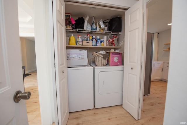 1914 Bayberry Ln, West Lafayette, IN 47906 - laundry area with independent washer and dryer and light wood-style floors
