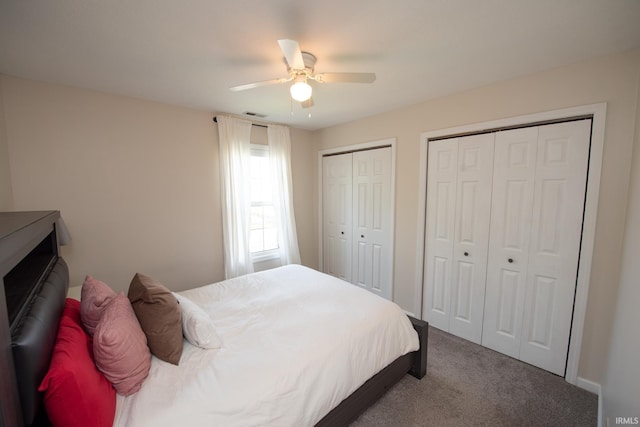 1914 Bayberry Ln, West Lafayette, IN 47906 - carpeted bedroom with two closets and a ceiling fan