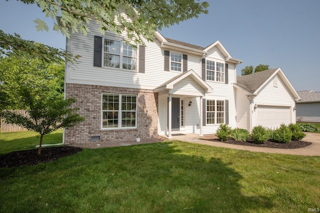 1914 Bayberry Ln, West Lafayette, IN 47906 - traditional home with a front yard, a garage, brick siding, and driveway