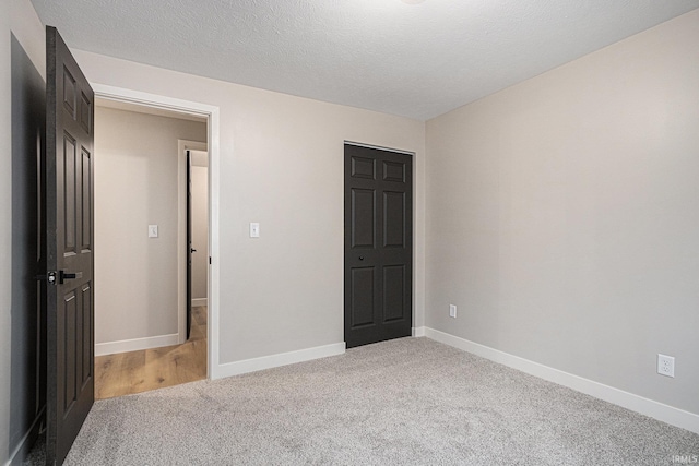 822 W Donaldson Ave, Mishawaka, IN 46545 - unfurnished bedroom with light colored carpet and baseboards