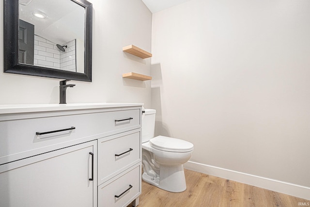 822 W Donaldson Ave, Mishawaka, IN 46545 - bathroom featuring wood finished floors and vanity