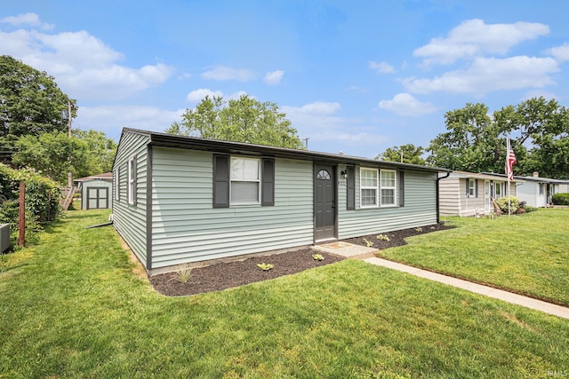 822 W Donaldson Ave, Mishawaka, IN 46545 - view of front facade with a front yard and a storage unit