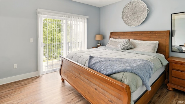 420 Catherwood Dr Unit 3, West Lafayette, IN 47906 - bedroom featuring access to exterior and wood finished floors