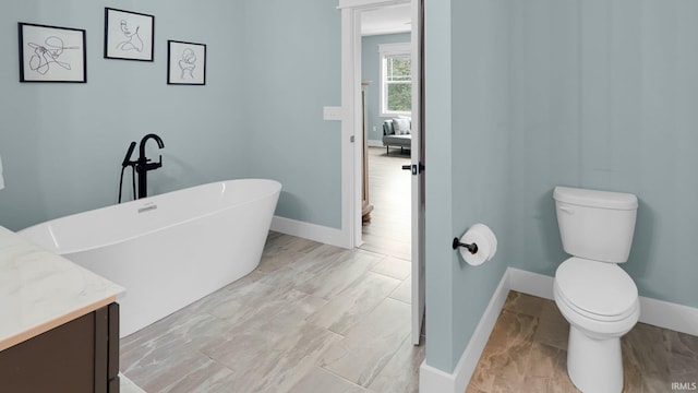 420 Catherwood Dr Unit 3, West Lafayette, IN 47906 - bathroom featuring a freestanding tub and vanity