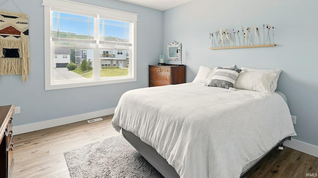420 Catherwood Dr Unit 3, West Lafayette, IN 47906 - bedroom with wood finished floors and baseboards