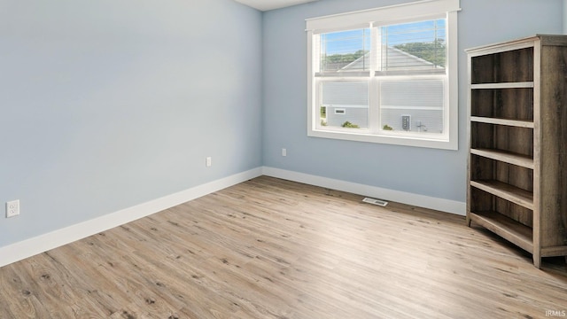 420 Catherwood Dr Unit 3, West Lafayette, IN 47906 - empty room with baseboards and wood finished floors